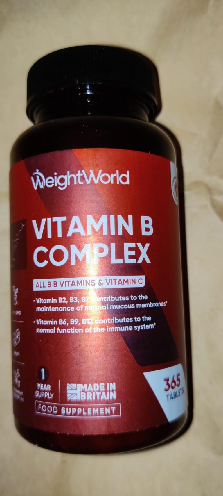 Flacon de complément alimentaire Vitamin B Complex, vue de face, sur fond clair. On peut lire le nom du produit et des inform...