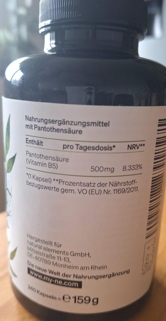 L'étiquette du flacon avec les informations nutritionnelles et les coordonnées du fabricant.
