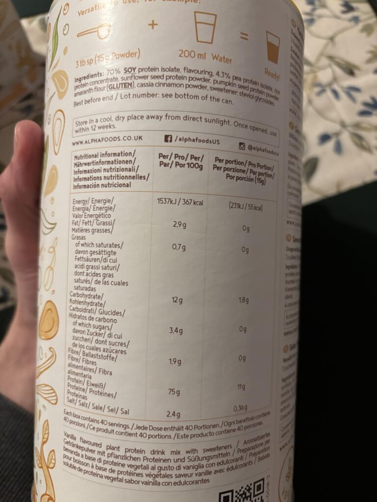Le dos du pot rigide (même produit que l'image 0), avec la liste des ingrédients et le tableau des valeurs nutritionnelles. M...