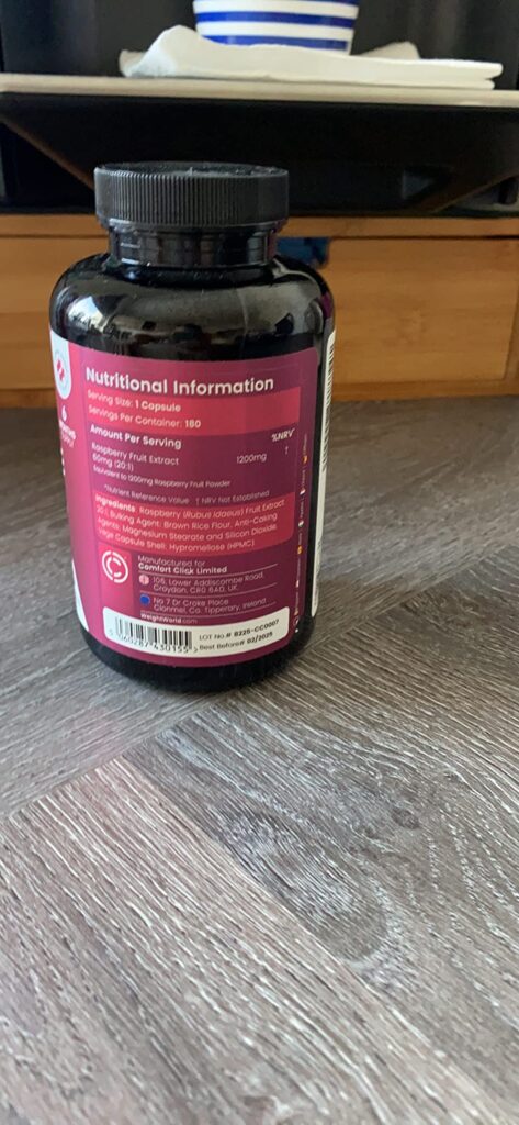 Vue arrière d'un flacon de compléments alimentaires montrant l'étiquette avec les informations nutritionnelles.