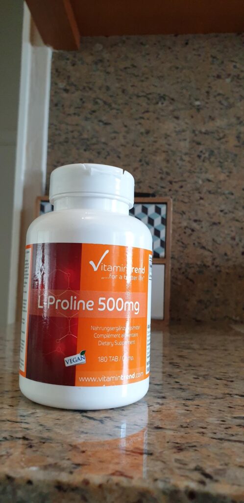 Flacon de L-Proline 500mg sur un plan de travail