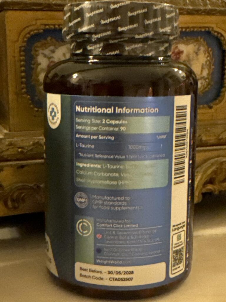 Flacon de L-taurine avec l'arrière de l'étiquette affichant les informations nutritionnelles et de fabrication.