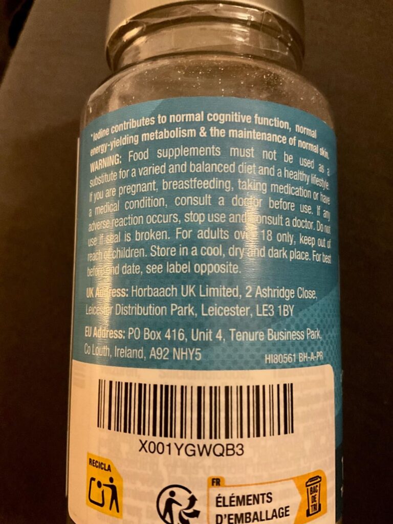 Partie arrière du flacon de compléments alimentaires, avec informations légales et code-barres