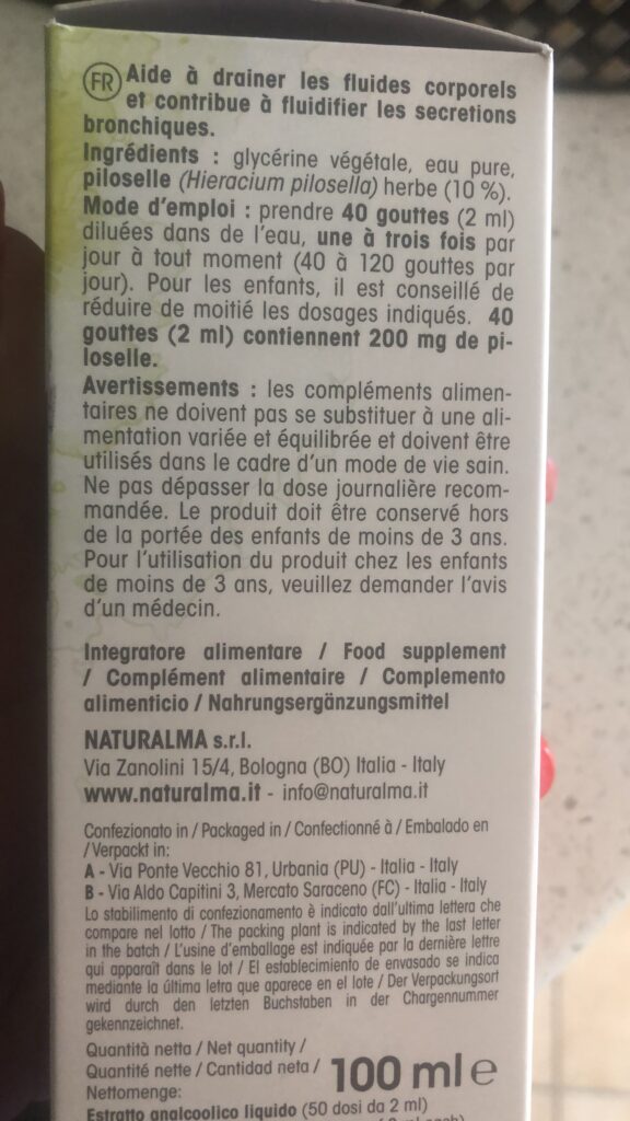Gros plan sur l'étiquette au dos de l'emballage, montrant les informations sur l'utilisation du produit.